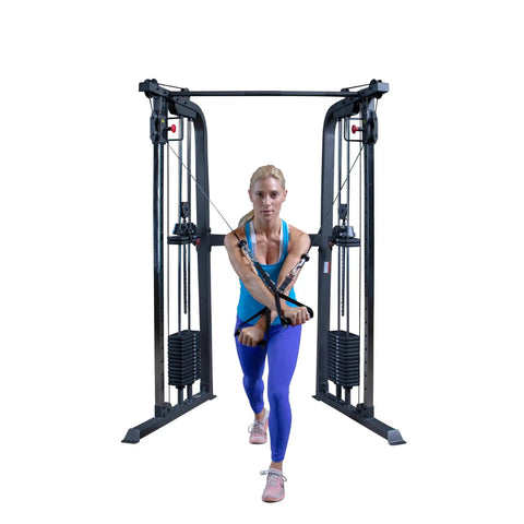 Top Shelf Dual Stack Cable Crossover Machine For Home And Commercial Gyms featuring a user performing a chest fly exercise.