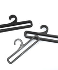Set Of 50 Black Plastic Hangers For Home And Retail Display, 7.7 Inch Long, space saver racks on white background