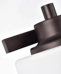 Close-up of oil-rubbed bronze detail on Solbi Contemporary 4 Light Oil Rubbed Bronze Bath Vanity Fixture with frosted glass.