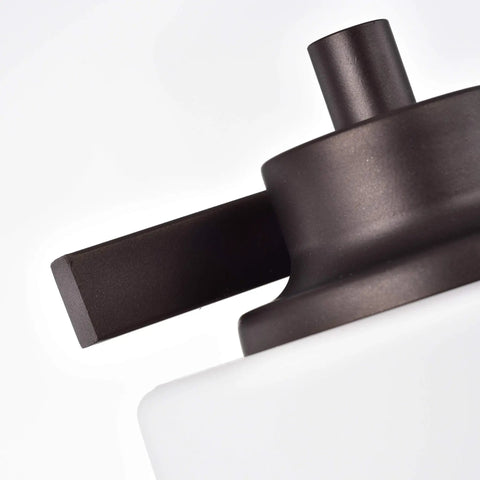 Close-up of oil-rubbed bronze detail on Solbi Contemporary 4 Light Oil Rubbed Bronze Bath Vanity Fixture with frosted glass.