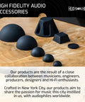 High fidelity audio accessories including 8-Pack 0.75-Inch Platinum Silicone Speaker Isolation Pads and anti-vibration mounts displayed on wood surface.
