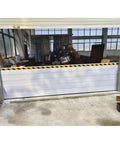 Heavy Duty Aluminum Flood Shields For Doors And Warehouse Openings, Reusable Modular Water Barrier With Thick Panels To Block The Surge, Tough As Nails For Rain And Wind Days installed at garage door.