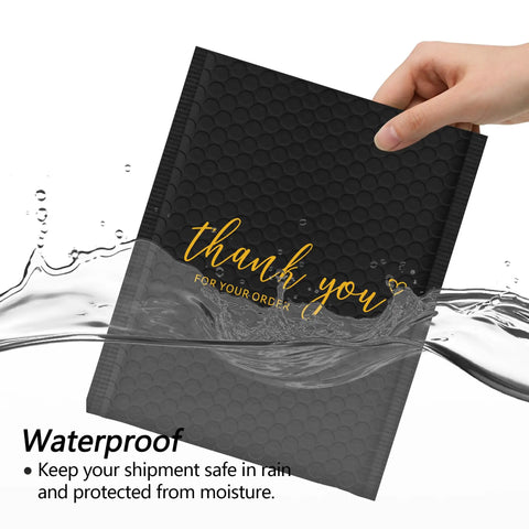 Hand holding Black 4x8 Inch Bubble Mailers 50 Pack Padded Envelopes with waterproof feature for secure shipping in water.
