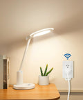 Plug And Play Remote Outlet Switch With Wireless On Off Control for lamps and fans, installed near desk lamp, compact design