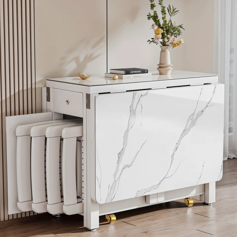 Modern white marble console table with folding stools stored underneath in a stylish living room setting, flowers on table.