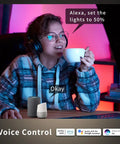 Person using voice control with 4 Pack 4 Inch RGB LED Recessed Downlights With J Box 10W 800LM, app controlled, relaxed setting.