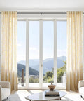 Room with Heavy Duty Blackout Curtain Rods For Windows 48 To 90 Inches With Wraparound Design, overlooking mountains.