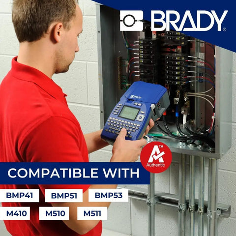Person using label maker in front of electrical panel, compatible with BMP41, BMP51, M510, and M511.