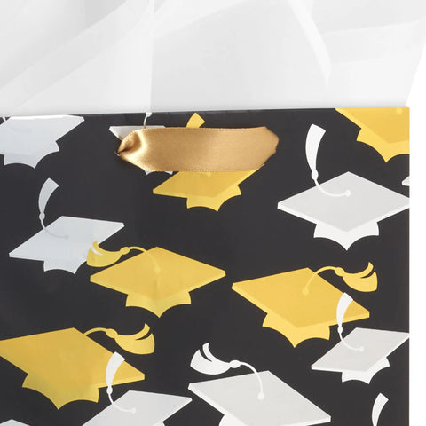 Medium Graduation Gift Bag with Tissue Paper featuring gold and silver mortarboards on black for college high school eighth grade kindergarten.