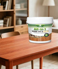 Slick All In One Cedar Wood Stain And Sealer One Gallon on a wooden table in a living room setting.