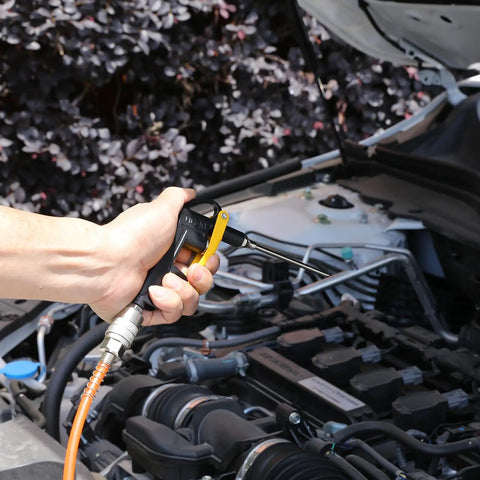 Essential Heavy Duty Compressor Accessory Kit Loaded With A Digital Tire Inflator Sharp Pressure Gauge Blow Gun in use on car engine.