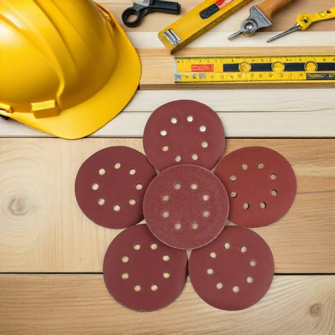 Get Your Workshop Ready With 150 Pc Grit Sanding Discs For Electric Sanders, Featuring 8 Holes And Loop Hook Design, displayed with tools.