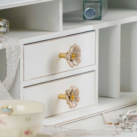 Premium Zinc Alloy Cabinet Knobs 4 Pack Featuring Floral Rhinestone Inlays Rust Resistant Drawer Pulls on white dresser drawers.