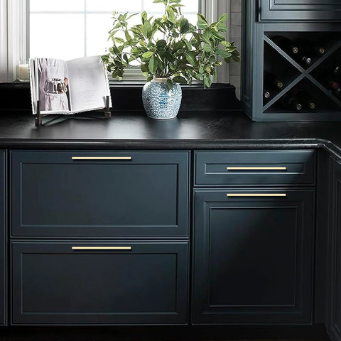10 Pack Brushed Brass Cabinet Pulls With 7 Point Five Inch Hole Centers on dark kitchen drawers, stylish gold tone hardware.