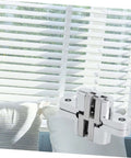 Concealed Folding Door Hinge Built Tough Heavy Duty Cabinet Hardware For Home Use Easy To Install next to white blinds and cushions
