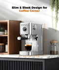 No Hassle One Touch Espresso Maker For Latte Americano Iced Coffee Silver Chassis on kitchen counter with coffee glass.
