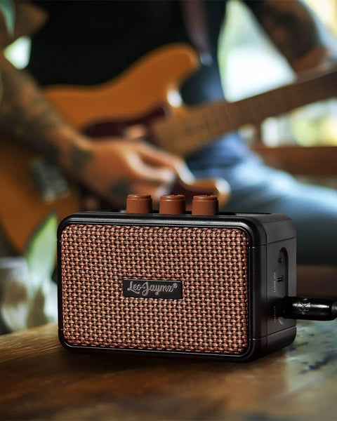 Ultra Portable 5W Dual Speaker Bluetooth Guitar Amplifier With Rechargeable Battery Clean And Overdrive Modes Headphone Jack