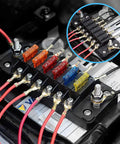 Rock Solid Six Way Fuse Block With Ground Rail Blade Fuse Panel For 12V And 24V Rides; close-up view showing connections and fuses.