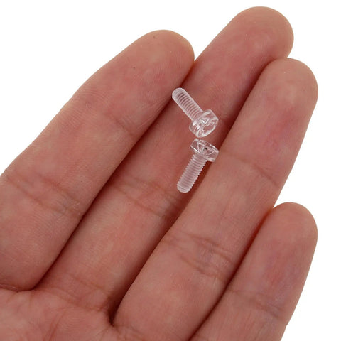 Clear Acrylic Bolt And Nut Kit, 100 Piece Transparent Fasteners Set For Precise Assembly And Rock Solid Fixation, Easy Install For Home DIY Electronics And Mechanical Projects, Sleek Transparent Screws And Nuts For A Clean Minimal Look. Two clear acrylic bolts and nuts in hand