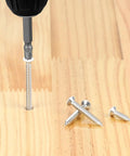 Big Time Grip Flat Head Wood Screws Size Eight By One Half Inch With Crisp White Painted Cap 304 Stainless Steel Mix being installed in wood.