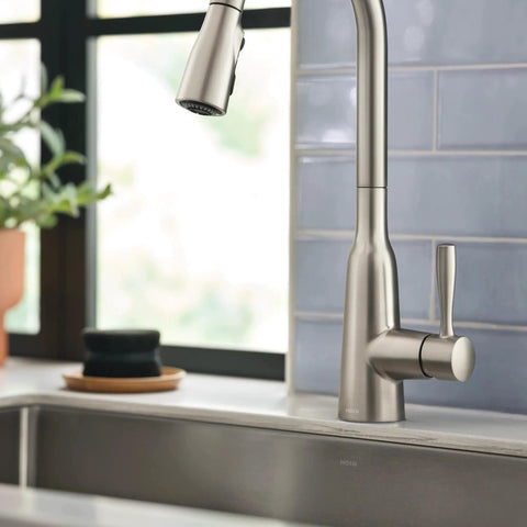 Top Shelf Stainless Steel Pull Down Kitchen Faucet Featuring One Handle High Arc Design With Fast Wash Power Boost And Smudge Resistant Matte Finish For Quick Cleanup And No Hassle Setup Plus Smooth Retractable Spray Hose Operation in kitchen setting.