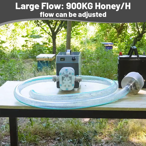 Straight Shooter Honey Filter Transfer Pump Featuring Durable 80 Mesh Stainless Screen For Zero Drama Beekeeping And Smooth Hauling Of Viscous Syrups And Paste on a table with adjustable flow.