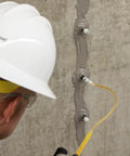 Worker using Flex-H20 Polyurethane Crack Sealer Injects Deep Into Concrete And Masonry Cracks From Tiny To Quarter Inch