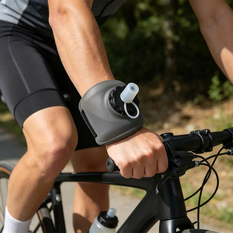 Cyclist wearing Hands Free Wrist Hydration Bottle 200ml Silicone Leak Proof Water Flask For Gym Running Cycling Hiking Climbing Jogging Walking