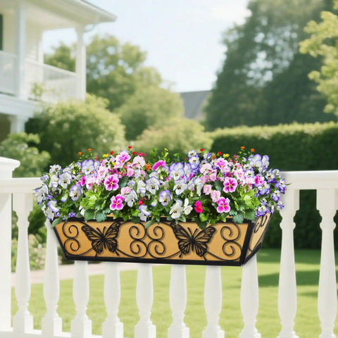 2 Pack 24 Inch Window Box Planters With Adjustable Brackets For Porch Fence Patio Balcony Hanging Flower Baskets Black Metal Outdoor Garden Decor With Woven Fabric And Elegant Butterfly Design hanging on a white porch railing with flowers.