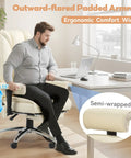 Al Day Comfort Massage And Heated Office Chair With Foot Rest in beige, showing ergonomic high back and adjustable armrests in an office setting.