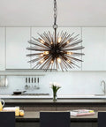 Black Sputnik Starburst Chandelier With 12 Lights 24 Inches Mid Century Firework Pendant Light Fixture in a modern kitchen