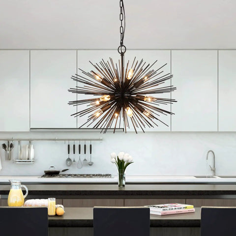 Black Sputnik Starburst Chandelier With 12 Lights 24 Inches Mid Century Firework Pendant Light Fixture in a modern kitchen