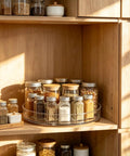 Clear Acrylic 11 Inch Lazy Susan Organizer With A Super Smooth 360 Spin That Makes Taming Kitchen Clutter in a pantry setting.