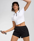 Model wearing Women's Low Rise Running Shorts With Mesh Lined Built-In Liner, Quick Dry Workout Short With Zip Pocket, black, 4 inch inseam