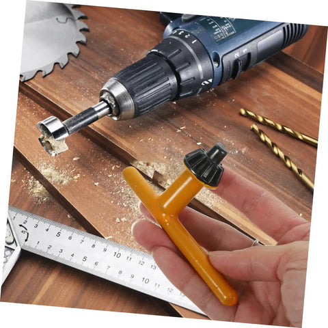 Pro Grade 4 Piece Drill Chuck Key Set With Comfort Grip Thumb Handle Quick Change No Sweat Design Heavy Duty Steel Body Iron Clad Wrench For Drill Press And Power Tool Shop Builds on wooden surface with drill.