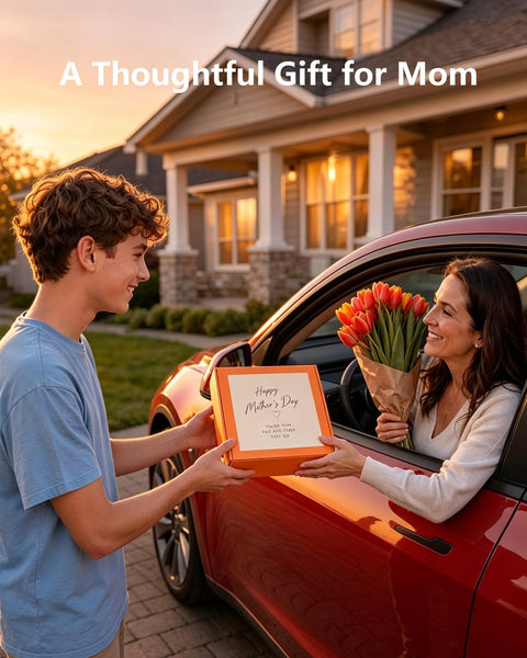 Woman receiving a Mother's Day gift and flowers from a young man by a car.