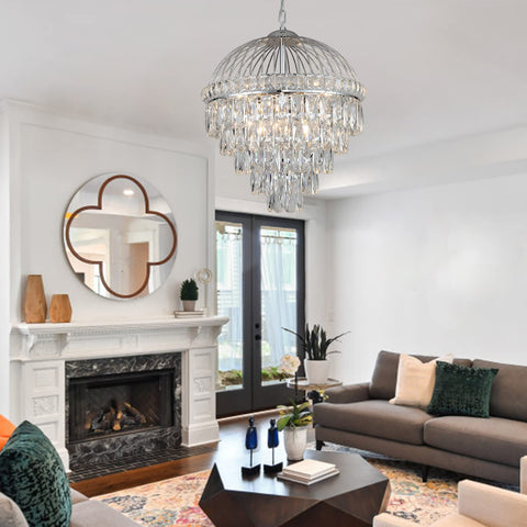 Nine Light Crystal Chandelier With K9 Crystals, Chrome Finish, Modern Luxe Vibe For Dining Room Or Living Room, 18 Inch Diameter, 19 Inch Height, Adjustable 39.4 Inch Chain, Perfect Foyer Or Kitchen Entry Light in a living room setting.