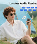 Person using the 64GB MP3 Player With 65 Hours Of Battery Life Ultra Lightweight Pocket Sized Music Player For Sports outside tent