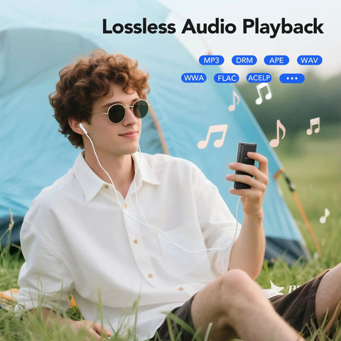 Person using the 64GB MP3 Player With 65 Hours Of Battery Life Ultra Lightweight Pocket Sized Music Player For Sports outside tent