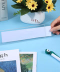 Pack Of 18 Clear Acrylic Desk Name Plates 2 By 8 Inches Blank Customizable Horizontal Slant being inserted on desk