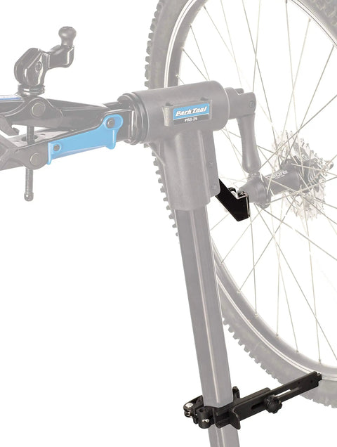 TS25 Wheel Truing Stand Repair Mount for Bikes attached to a repair stand with a bicycle wheel in position