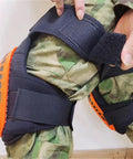 Close-up of Two Piece Heavy Duty Knee Pads Featuring Thick Gel Cushion And Secure Non Slip Straps in use on pants.