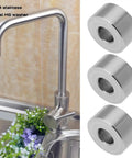 304 stainless steel M8 washer with kitchen faucet in background, showcasing 8Pcs 304 Stainless Steel Spacer Sleeves M8 Unthreaded Bushings Gaskets ID 8.2 X OD 20mm, Height 10mm, Tough As Nails For Mechanical Power Equipment And Metal Devices