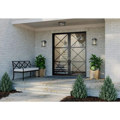 Two Light Outdoor Flush Mount Light In Antique Bronze With Clear Glass Diffuser on covered patio entrance.