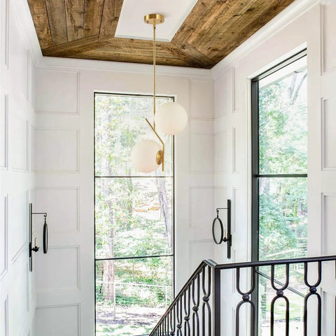 Two Light Glass Globe Pendant Light In Brushed Brass Gold Finish Modern Mid Century Style For Kitchen Island Large White Glass Globes Round Hanging Ceiling Light Sleek Contemporary Fixture in stairwell