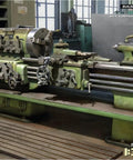 One Thirty Five Scale Lathe Machine Model Kit For Collectors Unpainted And Highly Detailed Build Ready Dope Hands On Hobby Tooling Miniature Workshop Gear For Ages Fourteen Plus showing intricately designed components on workbench.