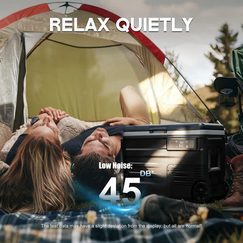 Couple relaxing in a tent with a closed Dual Zone Portable Fridge And Freezer With Heavy Duty Wheels, 42Quart Electric Cooler.