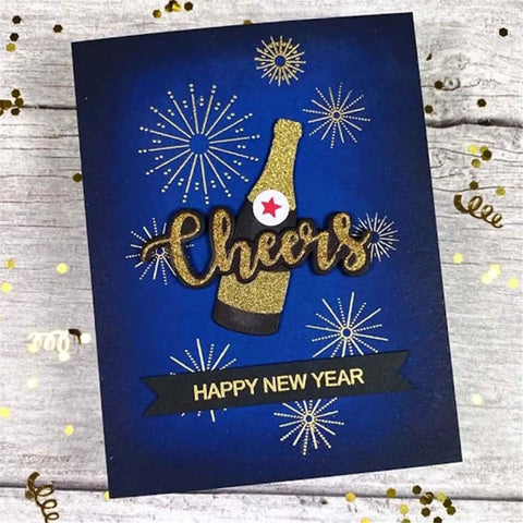 Wine Glass Clear Stamp And Die Set For Card Making with embossed 'Cheers' design and 'Happy New Year' banner on blue card