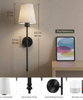 Konvixon Wall Sconces Battery Operated Set of Two, RGBWW with Remote, Black on a wall beside an iPad for size reference.