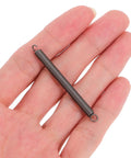 Get The Ultimate 20 Pc Small Stainless Steel Extension Springs Kit With Hook Ends Perfect For Quick Home Repairs Crafts And Mechanical Jobs To Fix Fence Gates Appliance Hinges Super Easy Install Tension Hardware. small hooked steel extension spring in hand